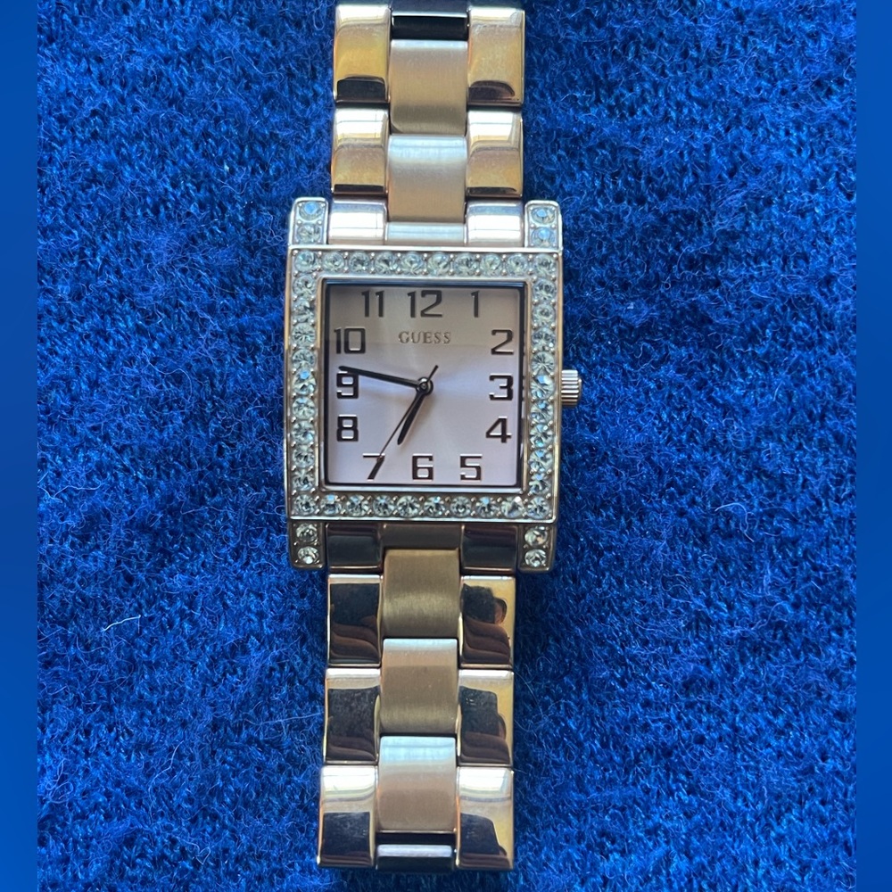 Guess women’s rose gold watch